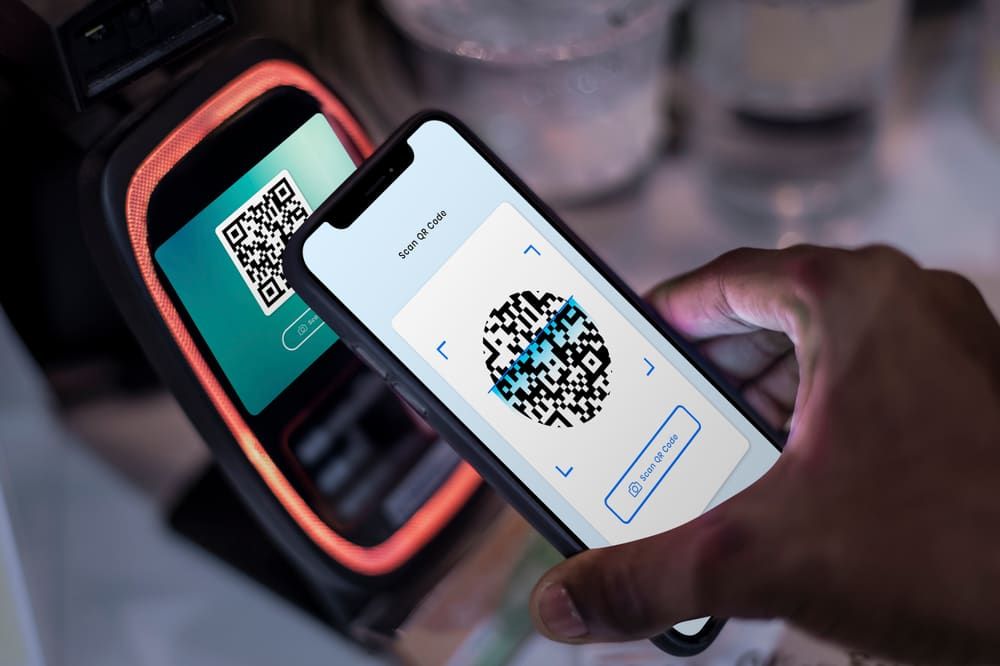 Scanning a QR code invitation on a smartphone